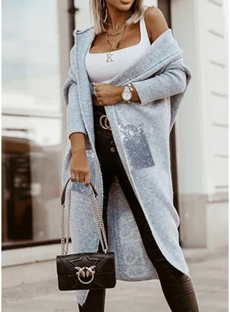 Heidi-Mode | Lässige Strickjacke mit Kapuze und Taschen
